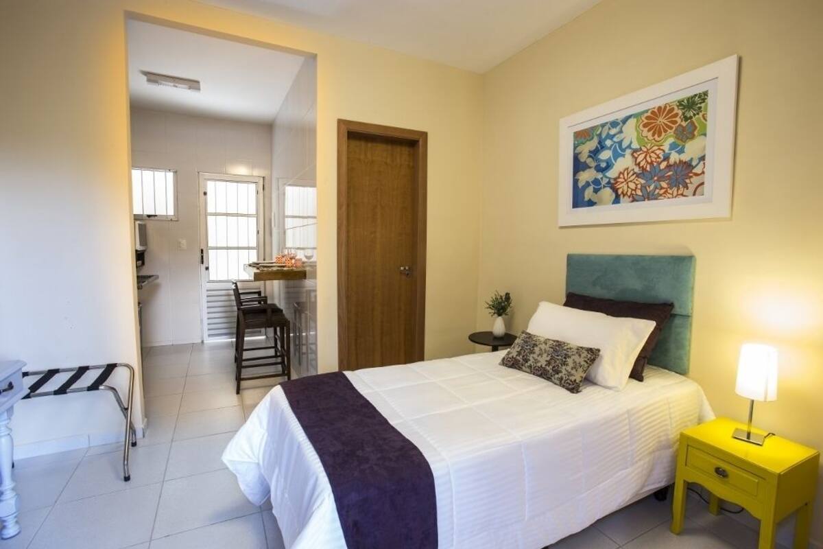 Eenpersoonskamer (Villa Single) | Een minibar, een kluis op de kamer, een strijkplank/strijkijzer