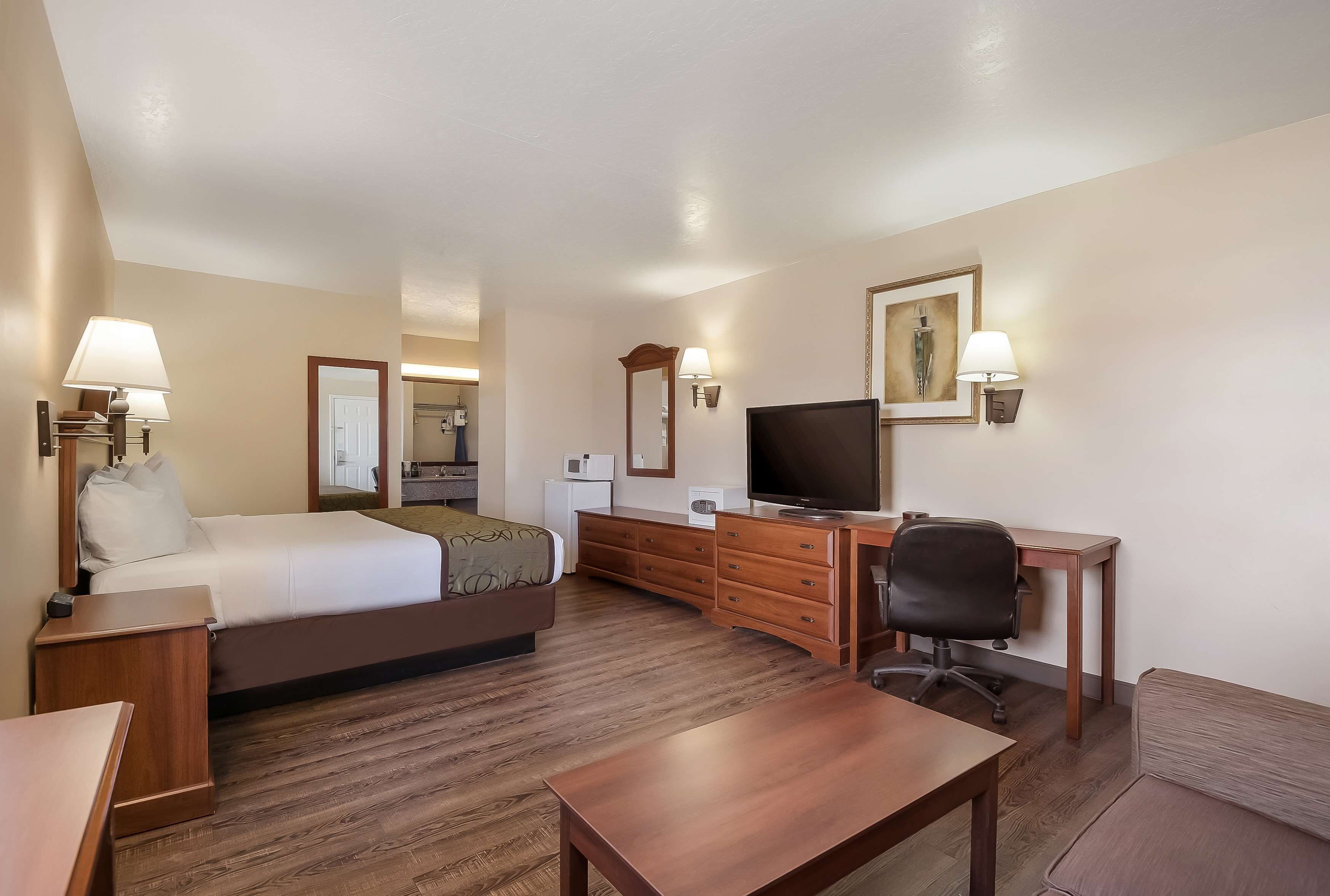 Suite, 1 King Bed, Non Smoking, Microwave | Individually furnished, desk, laptop workspace, iron/ironing board