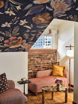 Egyptian cotton sheets, premium bedding, pillowtop beds, minibar at The Crawford Hotel
