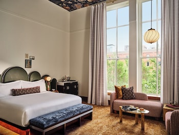 Egyptian cotton sheets, premium bedding, pillowtop beds, minibar at The Crawford Hotel