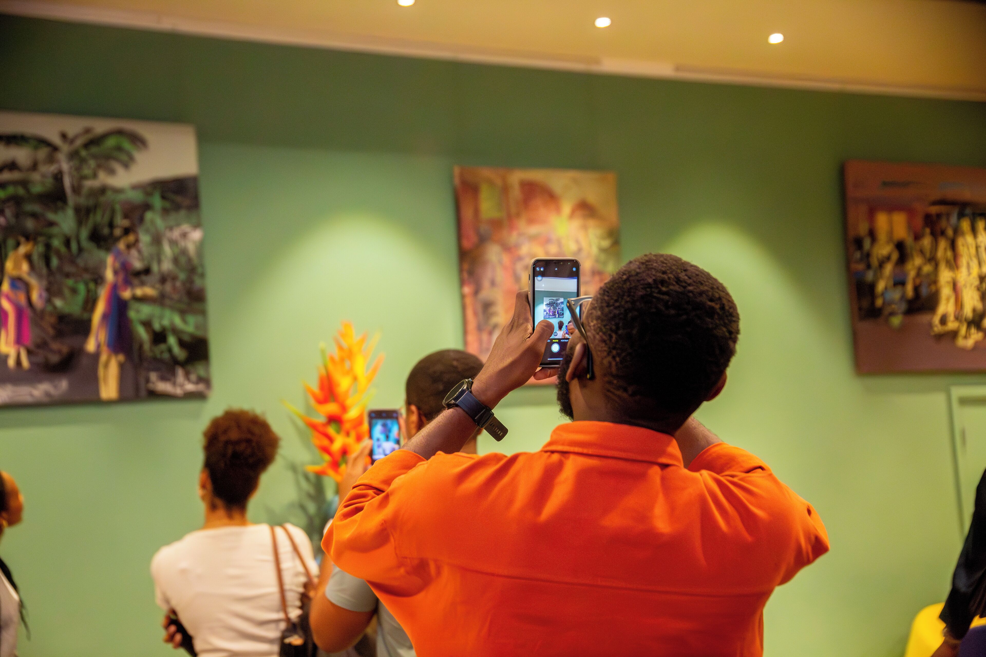 A person taking a photo with a smartphone.