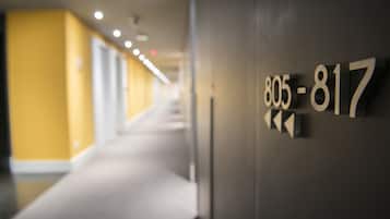 A hallway with a number sign indicating room 805-817.