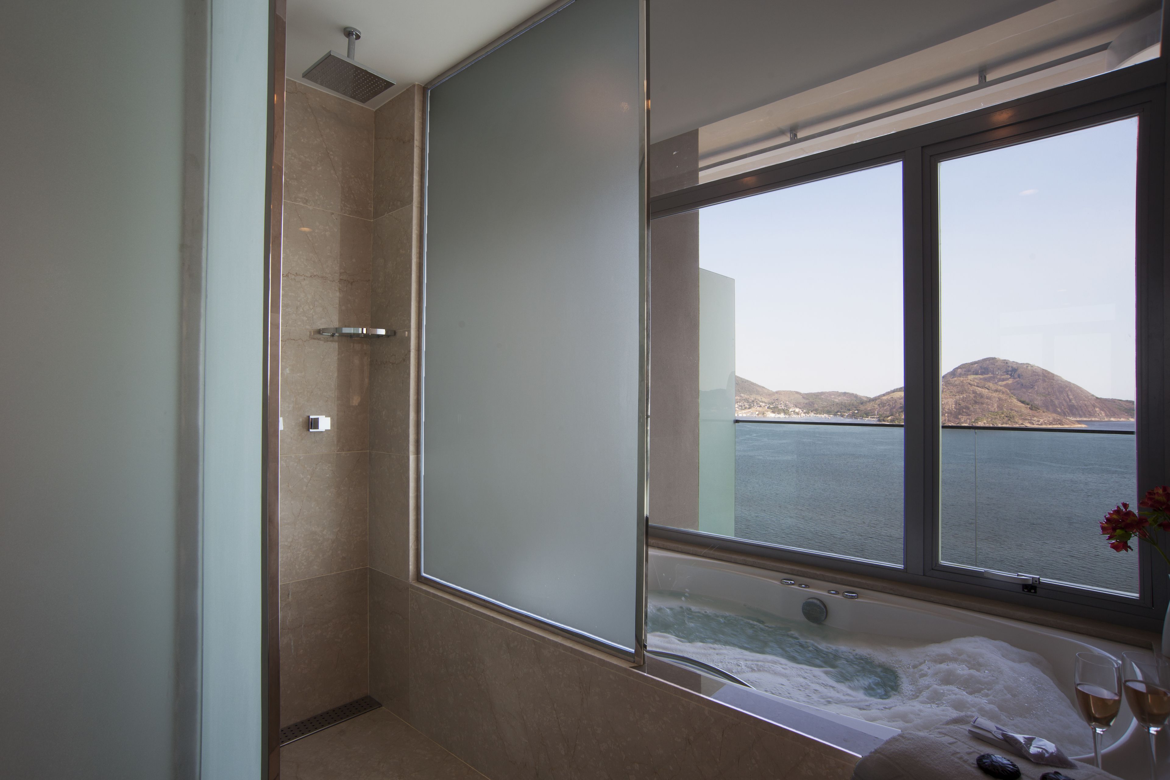 presidential suite, ocean view | bathroom | shower, free toiletries, hair dryer, towels