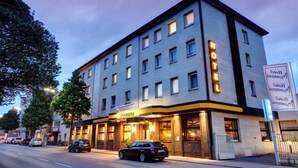A multi-story hotel with a modern facade, a prominent 'HOTEL' sign, and a visible entrance with a canopy. - Montana Hotel Mönchengladbach (Moenchengladbach)