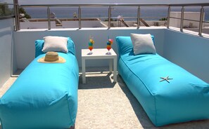 Suite, spabadekar, sjøutsikt | Terrasse/patio