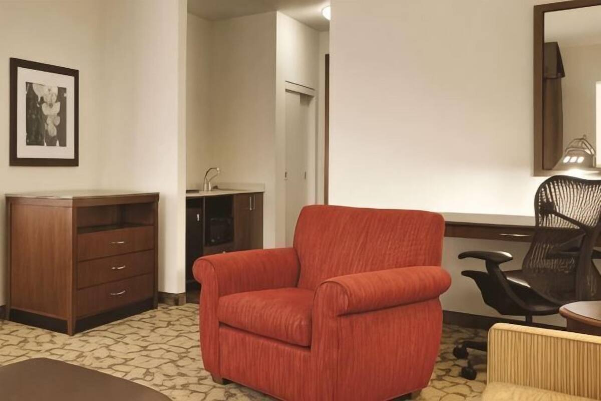 Área de sala de estar | Televisión de pantalla plana, estación para iPod y películas con cargo