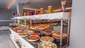 A buffet with various dishes and condiments. - Orka World Hotel & Aquapark (Fethiye)