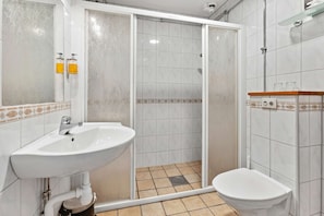 Hair dryer, towels, soap, shampoo
