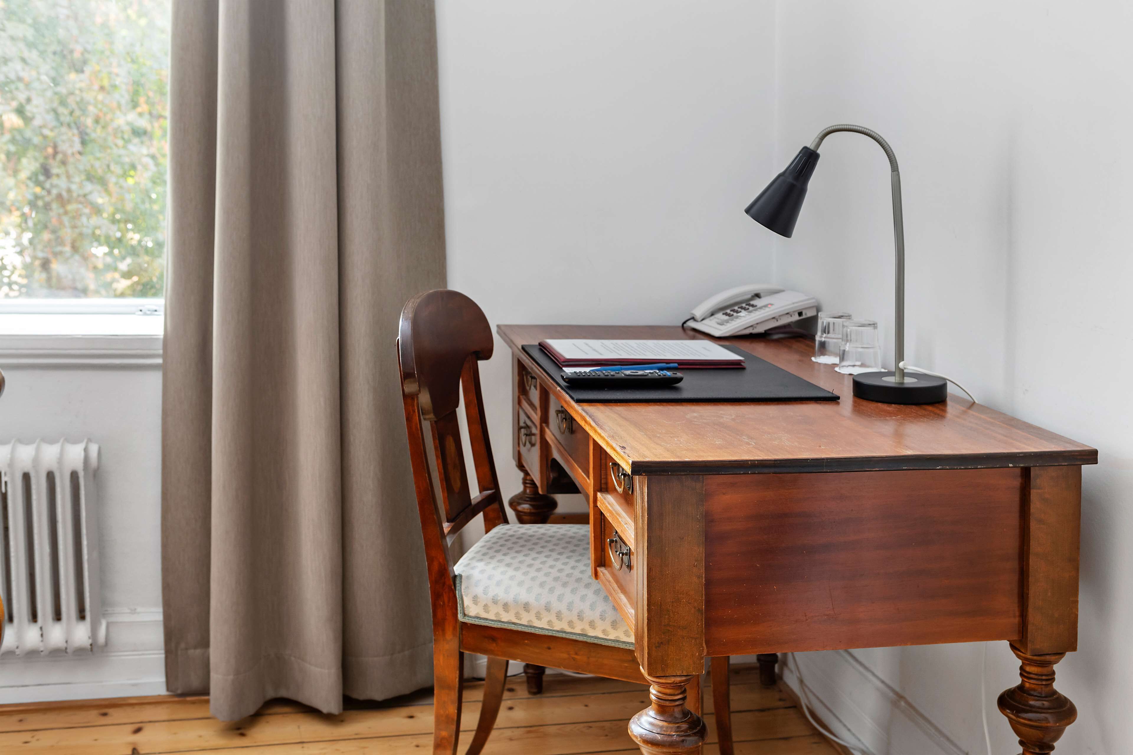 superior room, 1 king bed, non smoking | in-room safe, individually decorated, individually furnished, desk