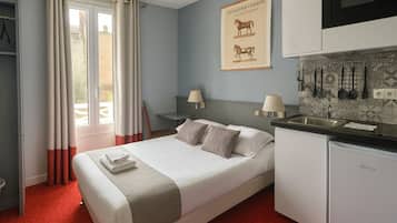 Habitación individual, cocineta | 8 habitaciones, ropa de cama de alta calidad y muebles diferentes