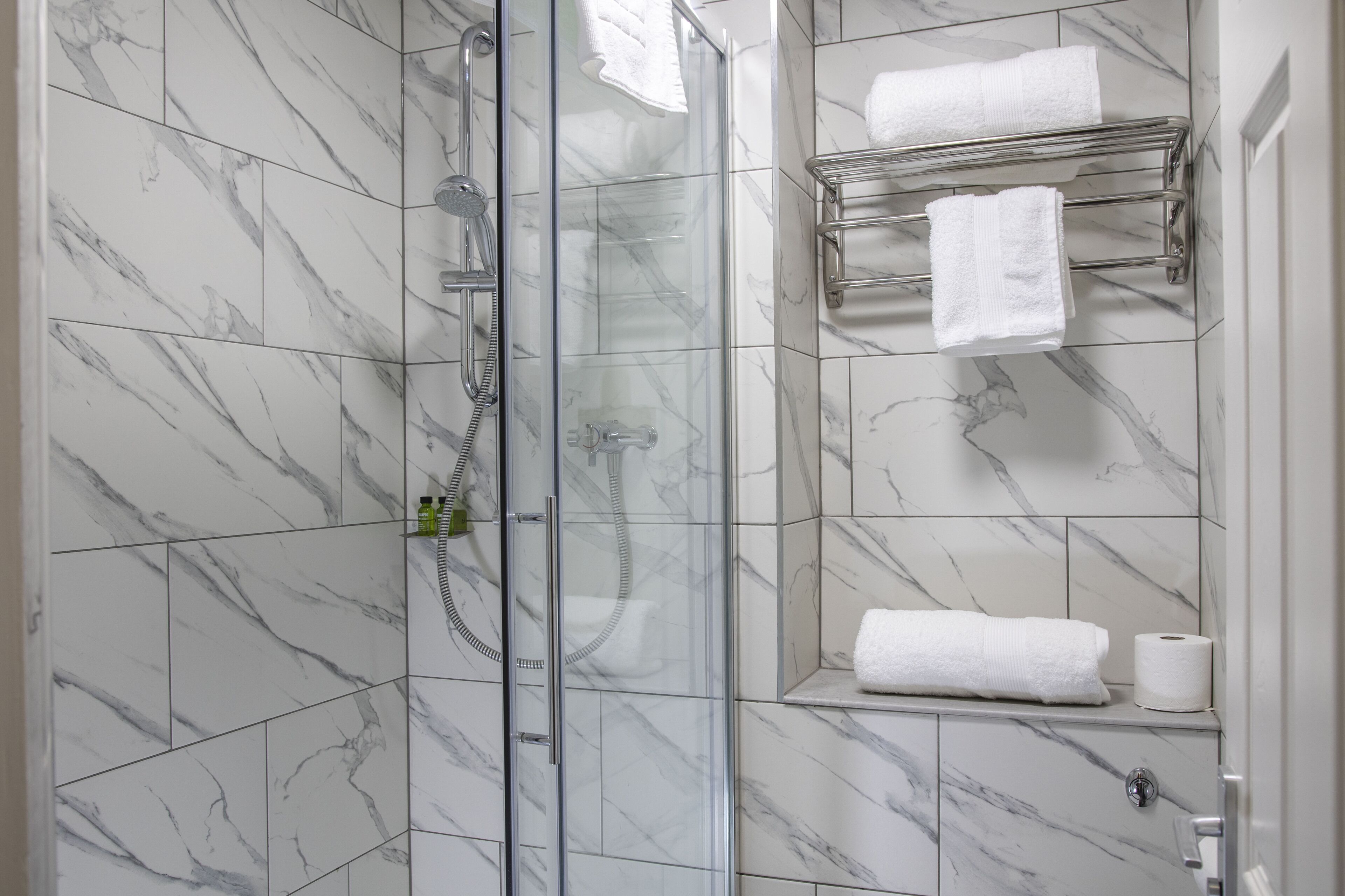 combined shower/bathtub, free toiletries, hair dryer, towels