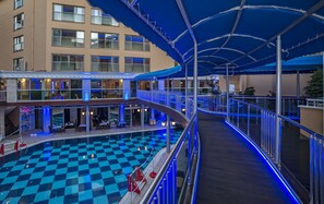 Seasonal outdoor pool, pool umbrellas, pool loungers