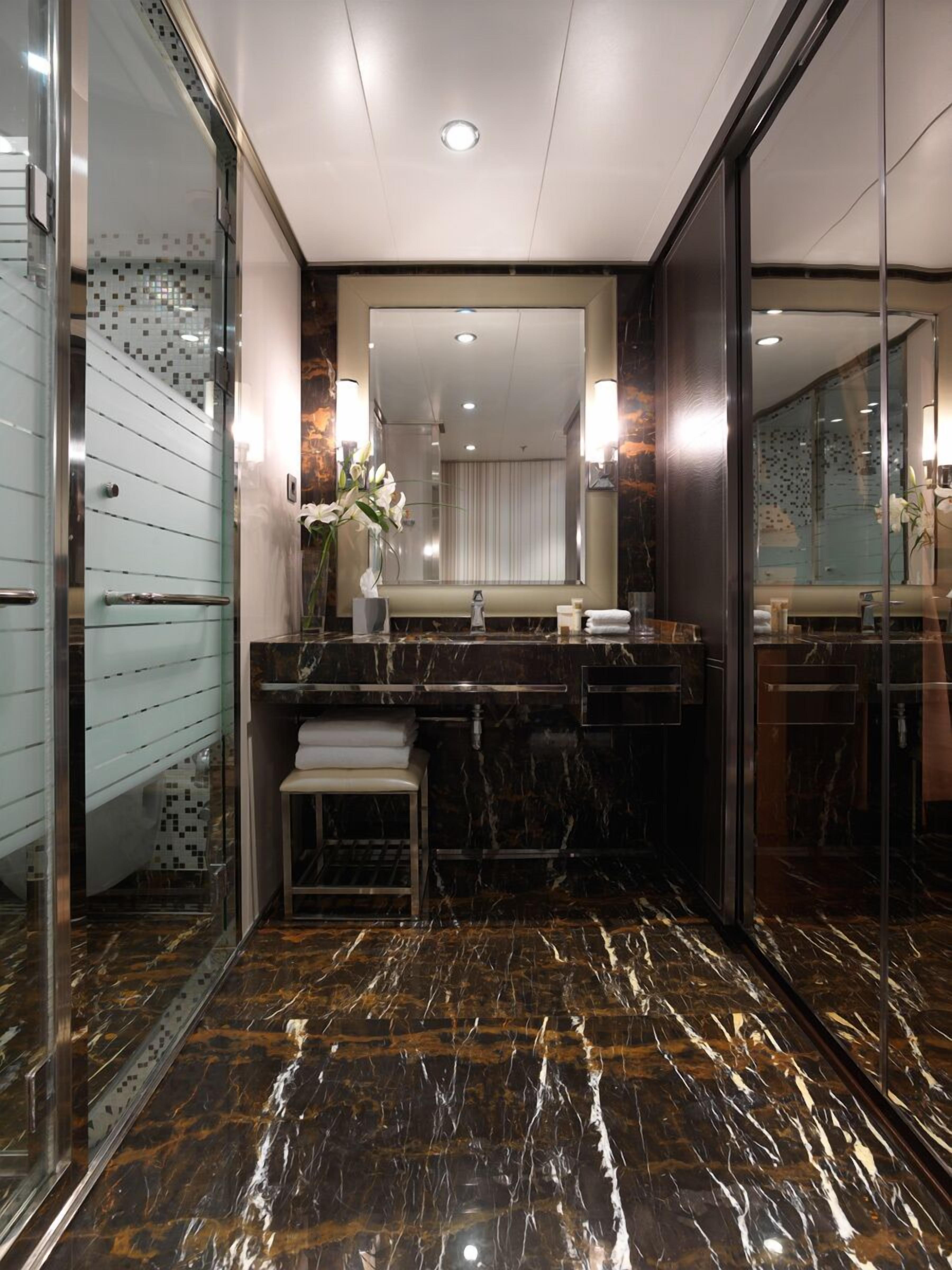 basic double room, 1 king bed | bathroom | eco-friendly toiletries, towels