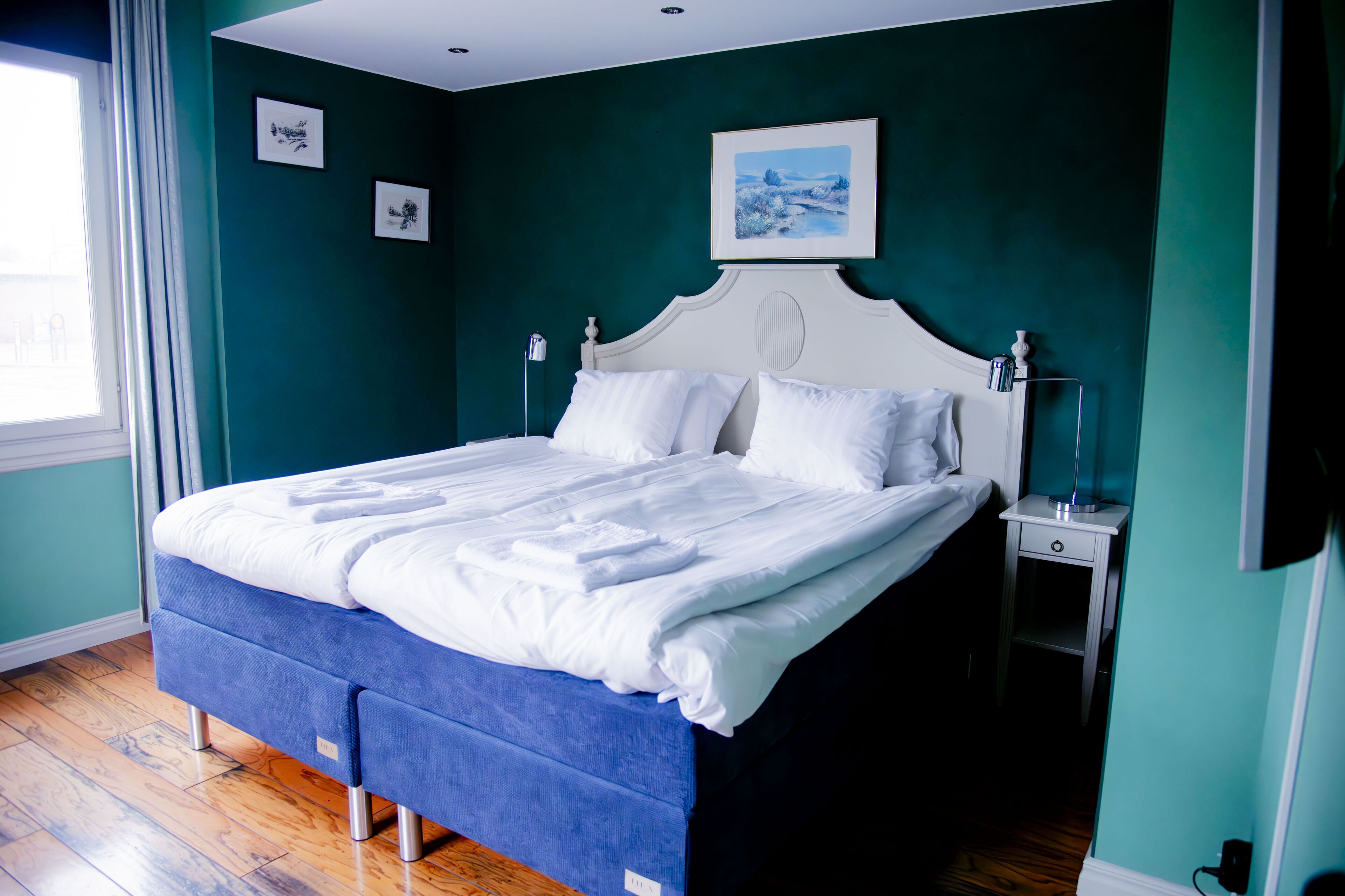 Deluxe Quadruple Room | Individually decorated, individually furnished, desk, laptop workspace