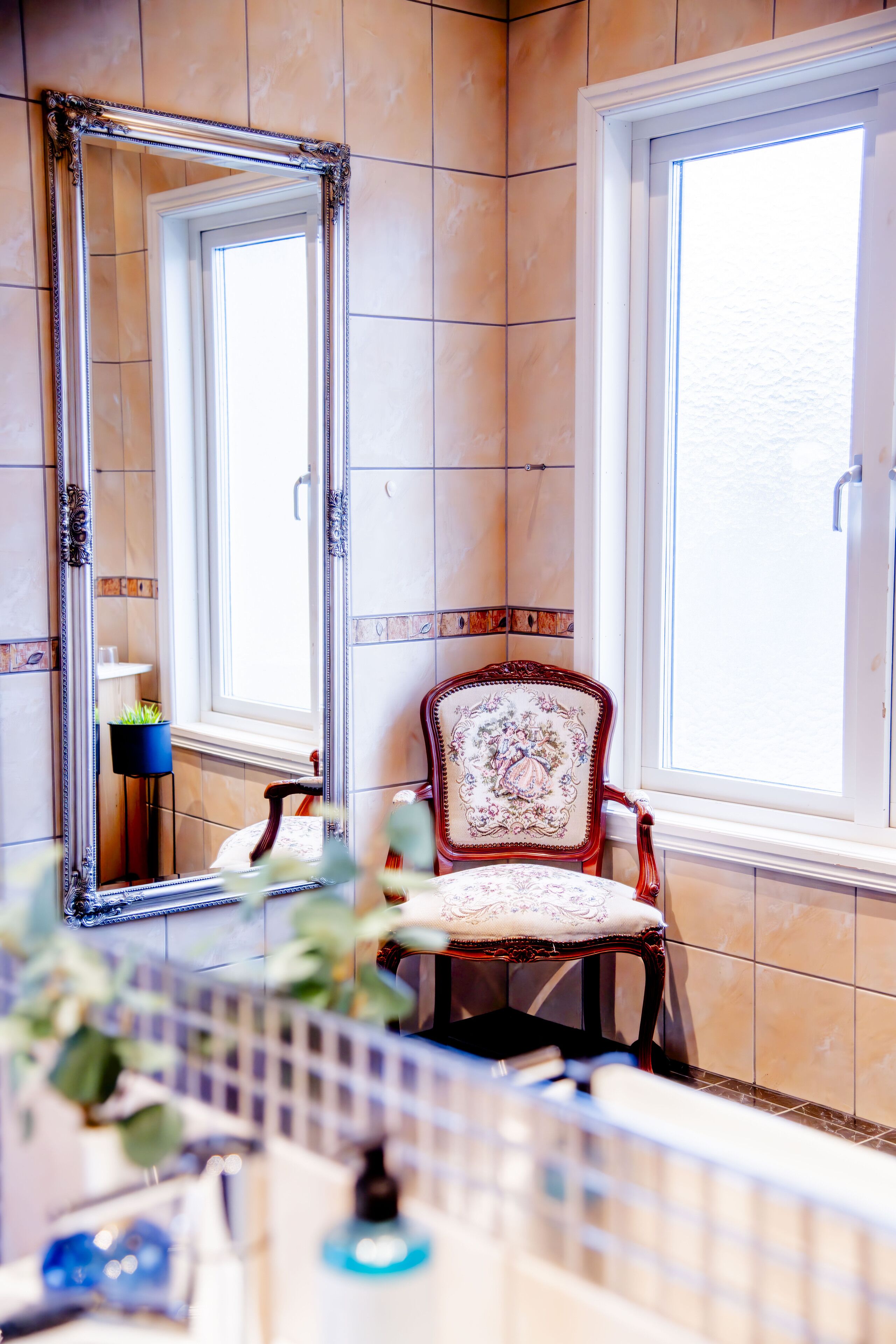 deluxe quadruple room | bathroom | hair dryer, towels, soap, shampoo