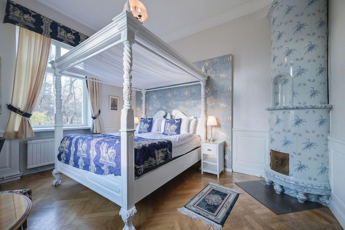 Minibar, desk, blackout curtains, iron/ironing board
