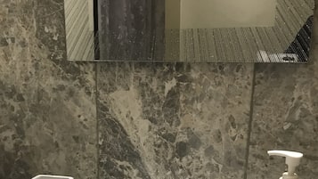 Shower, free toiletries, hair dryer, towels
