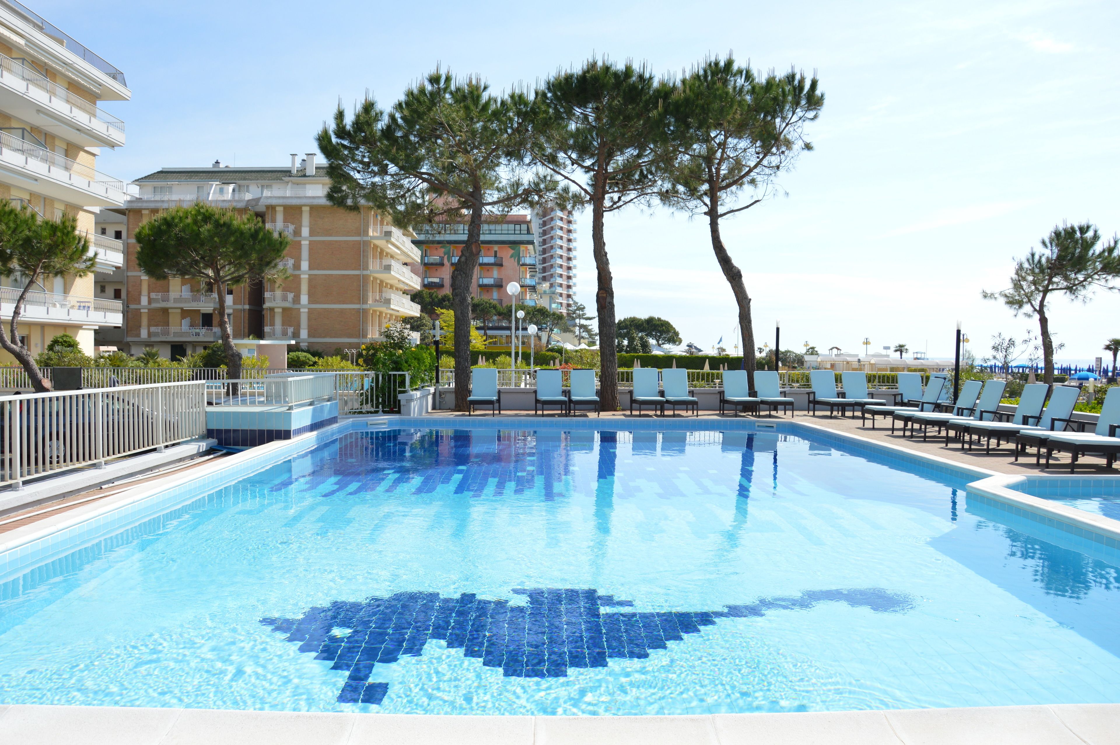 2 outdoor pools, open 9:00 am to 6:30 pm, pool umbrellas, pool loungers