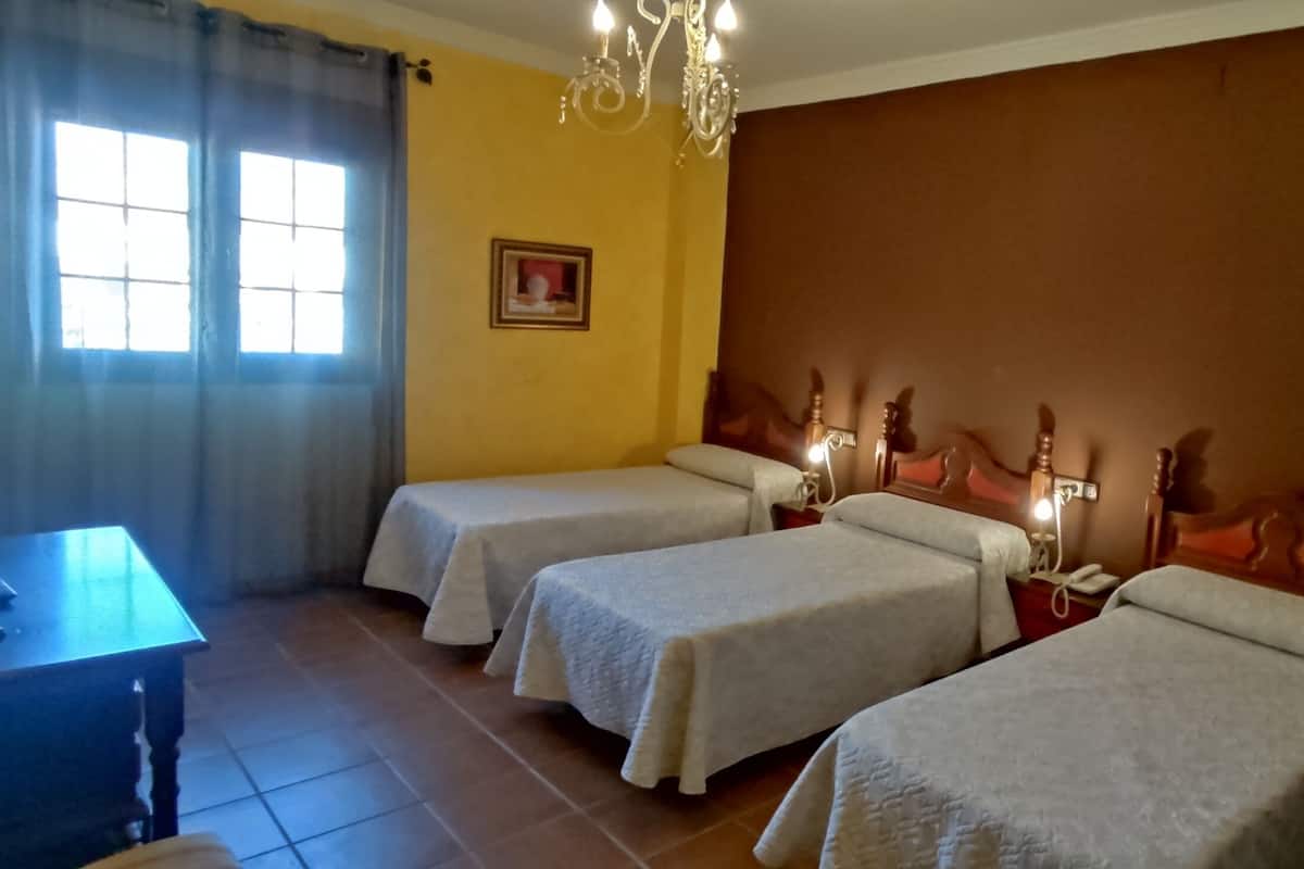 Triple Room | Down comforters, individually furnished, desk, laptop workspace