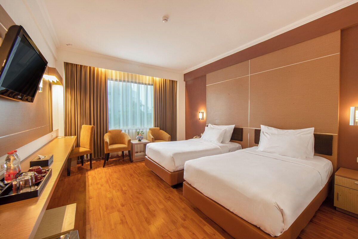 Ropa de cama de alta calidad y minibar 