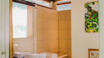 Shower, eco-friendly toiletries, towels, soap
