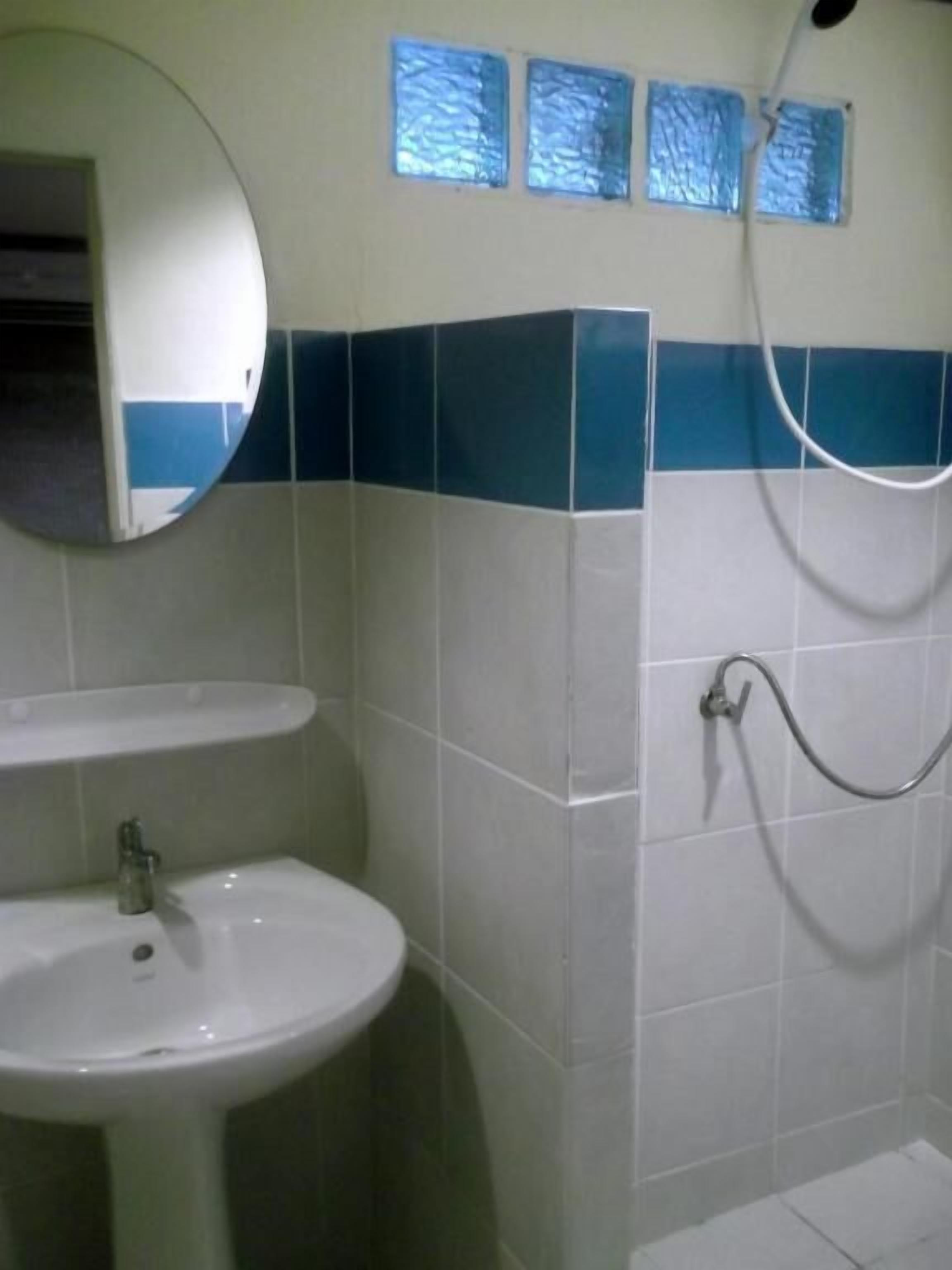 shower, towels, soap, toilet paper