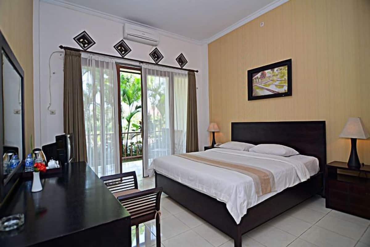 Habitación estándar | Ropa de cama de alta calidad y minibar