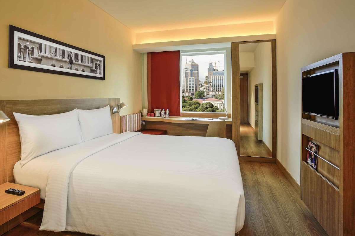 Quarto, 1 cama Queen (New Beginnings) | Roupas de cama premium, frigobar, cofres nos quartos