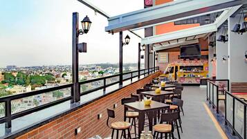 Breakfast, lunch, dinner served; Indian cuisine, al fresco dining