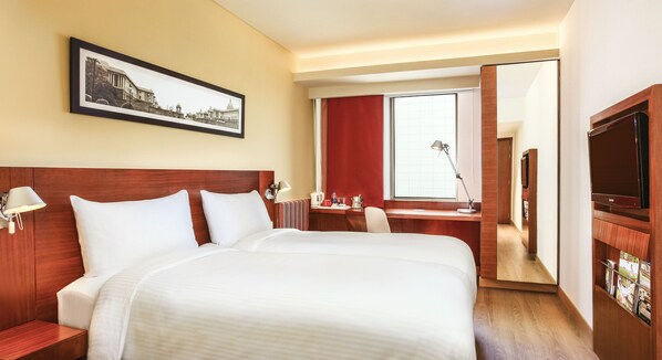 Biancheria da letto di alta qualità, minibar, cassaforte in camera
