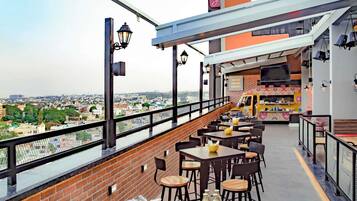 Breakfast, lunch, dinner served; Indian cuisine, al fresco dining