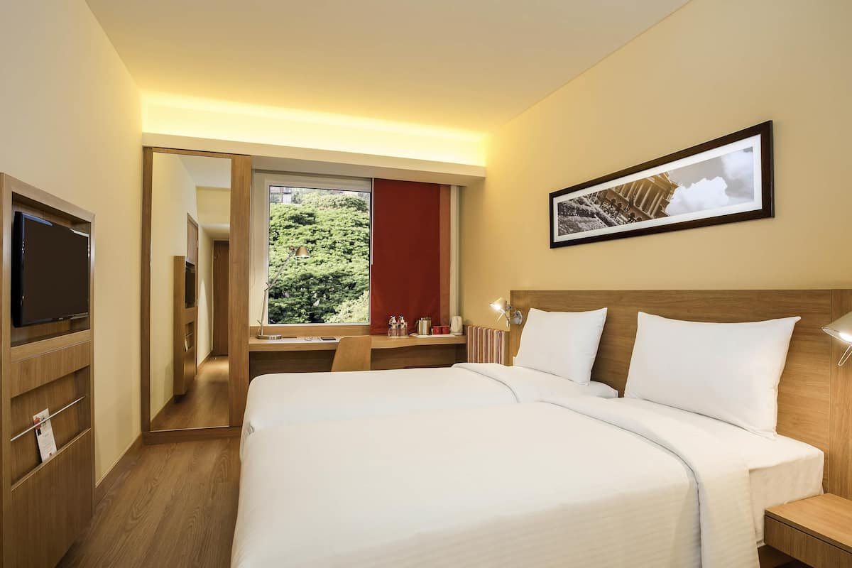 Ropa de cama de alta calidad y minibar