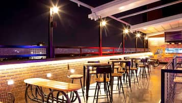 Breakfast, lunch, dinner served; Indian cuisine, al fresco dining