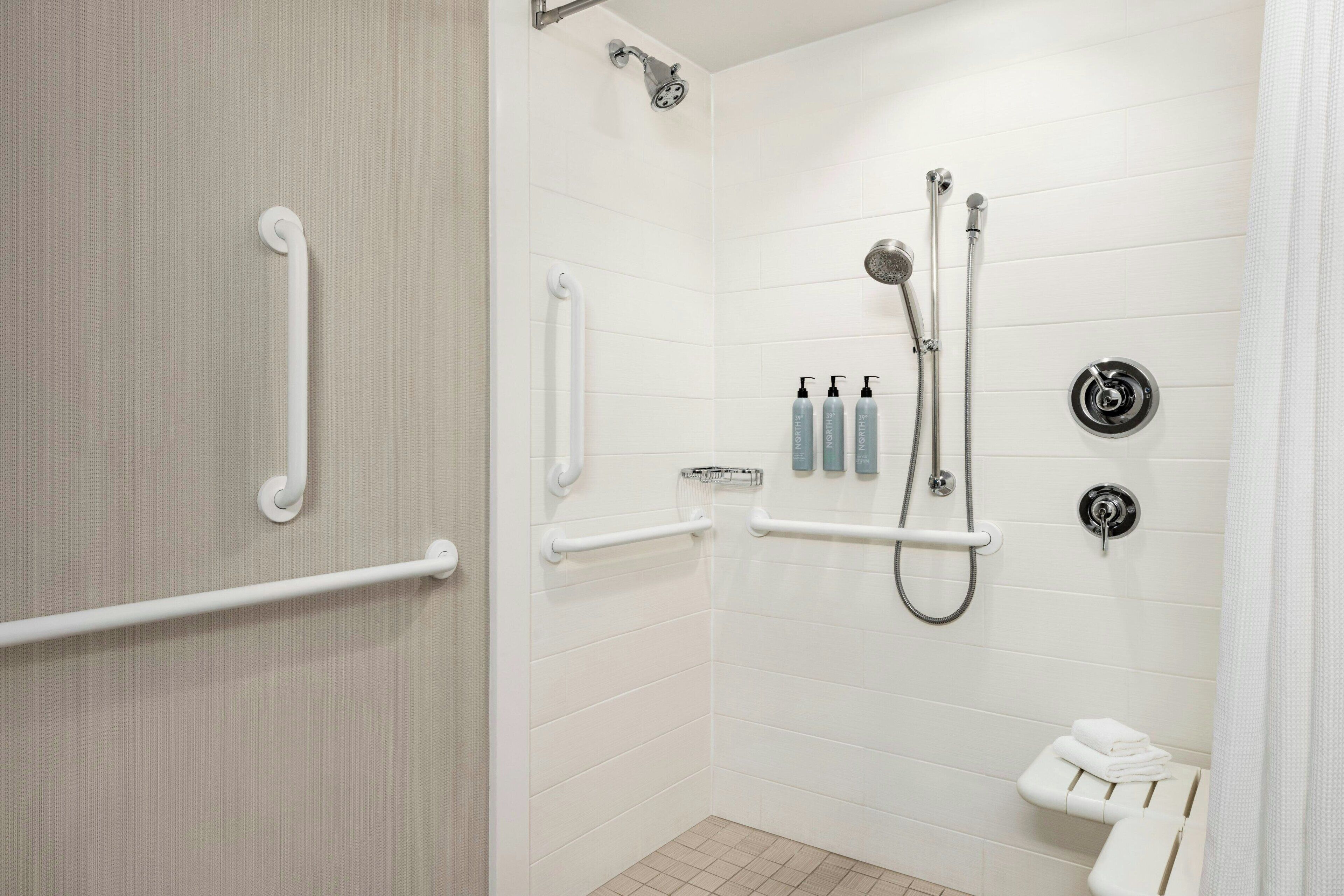 rainfall showerhead, free toiletries, hair dryer, towels