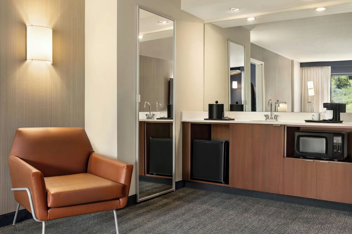 Suite, 1 Bedroom | Living area | Flat-screen TV