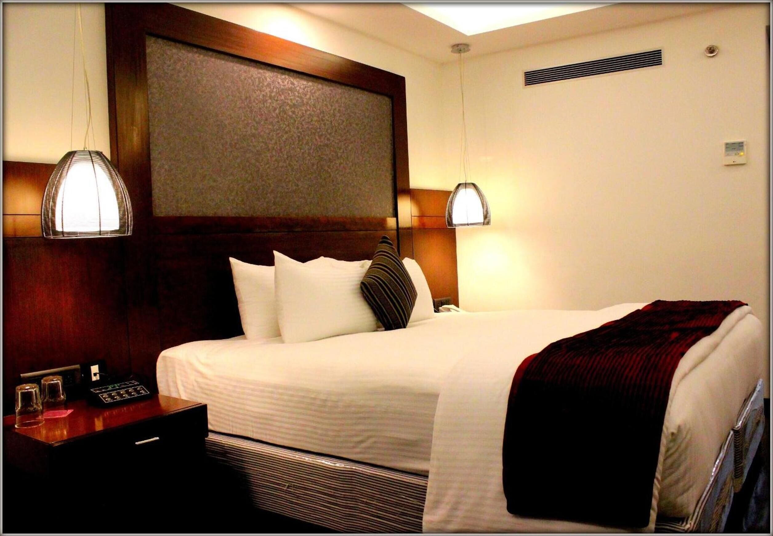 deluxe double room | premium bedding, minibar, in-room safe, desk