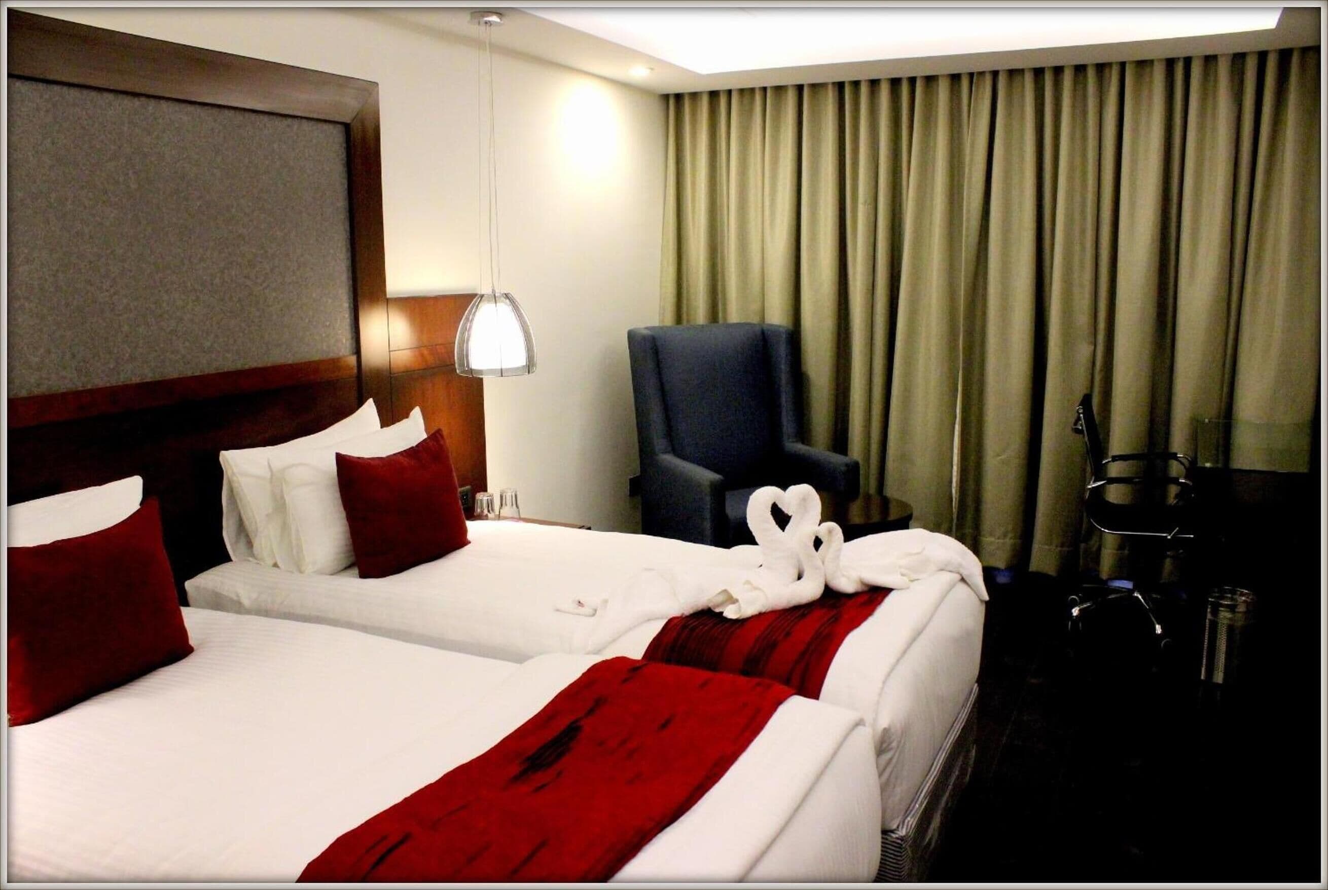 deluxe double room | premium bedding, minibar, in-room safe, desk