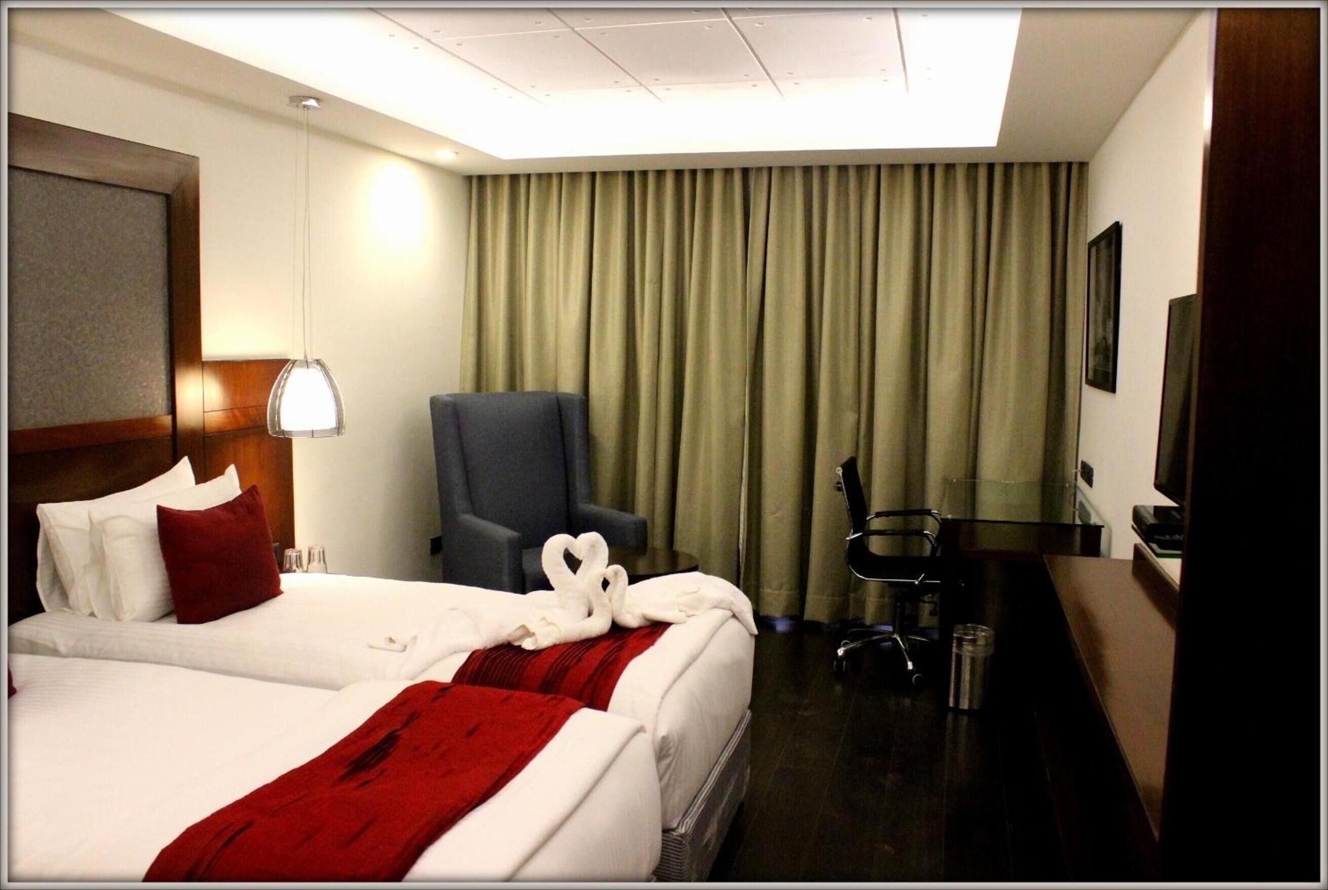 deluxe double room | premium bedding, minibar, in-room safe, desk