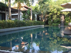 Outdoor pool, pool umbrellas, sun loungers