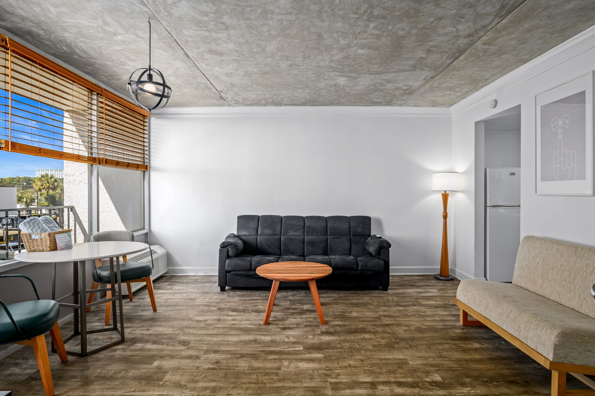 standard suite, 1 bedroom, kitchenette, partial ocean view | living area | 43-inch flat-screen tv with premium tv channels, tv