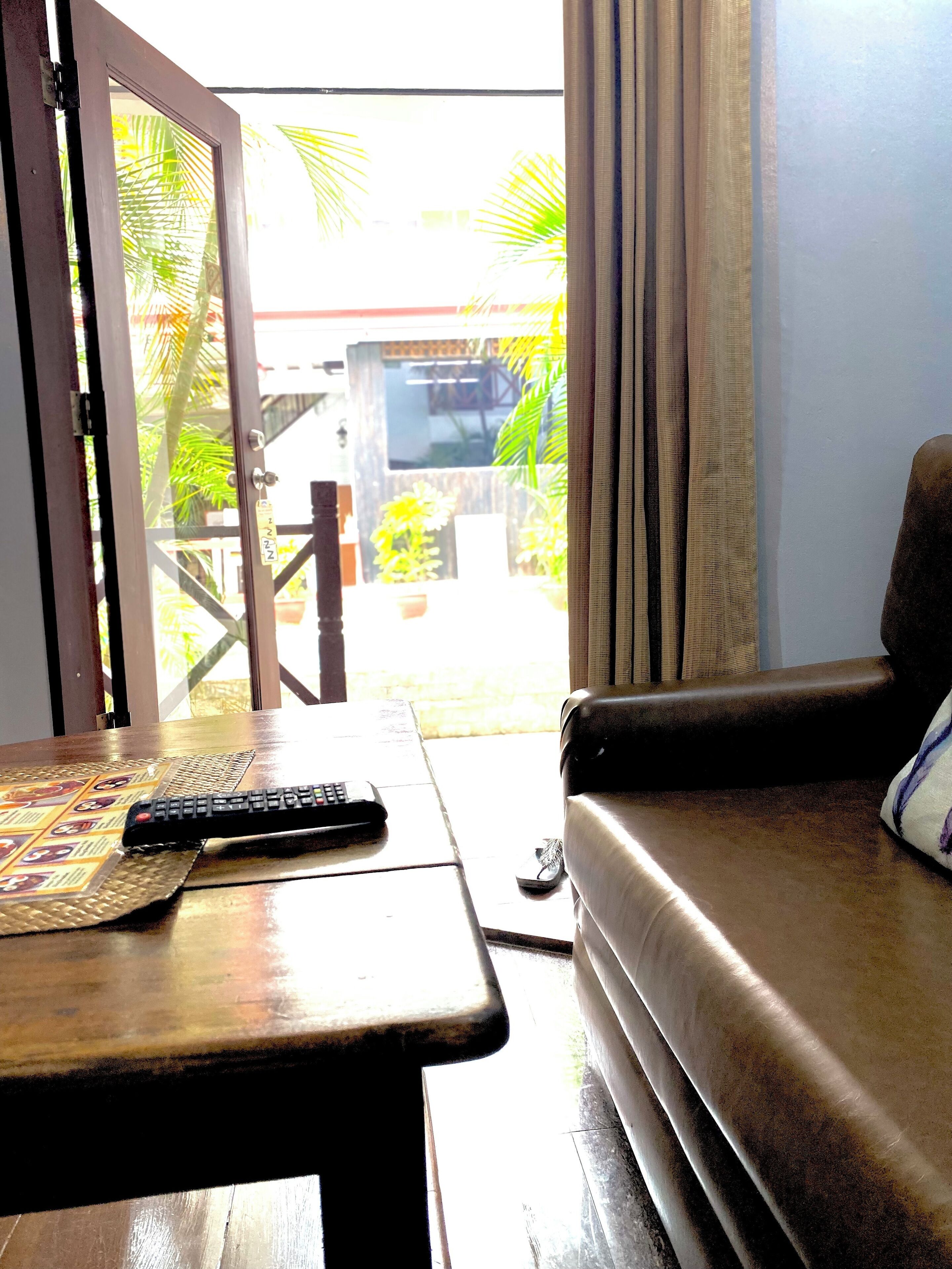 standard condo | living area | led tv