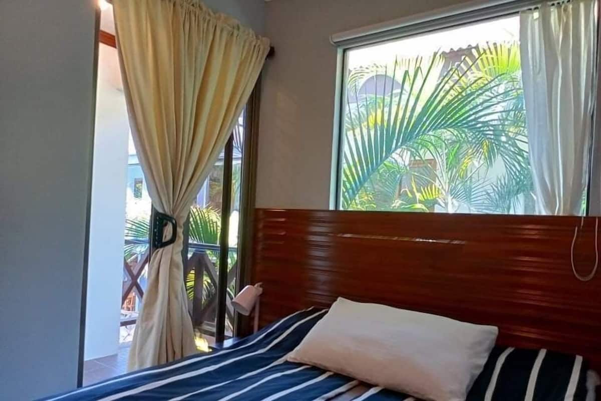 Standard Condo | Premium bedding, minibar, in-room safe, iron/ironing board