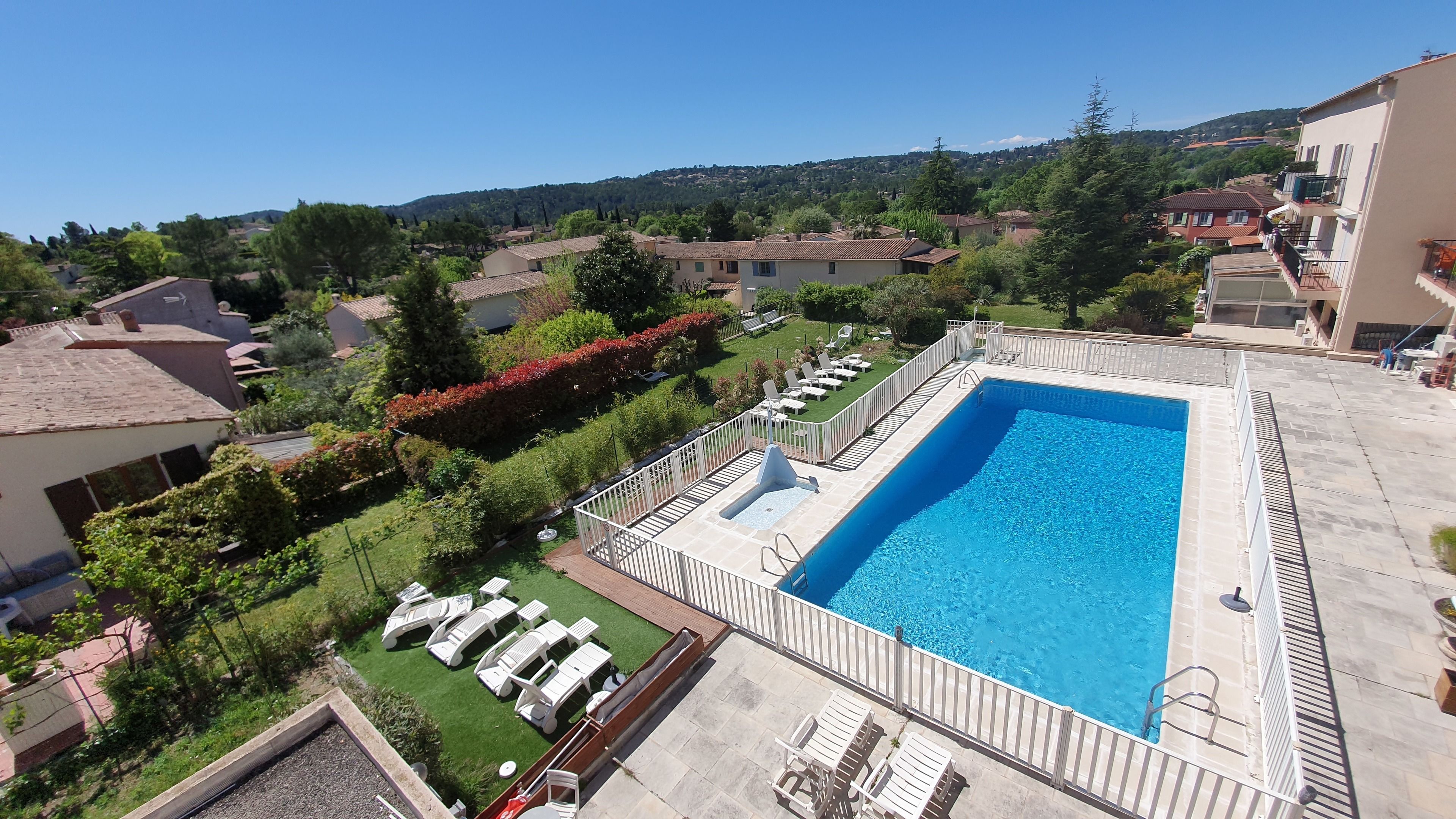 Seasonal outdoor pool, open 9:00 AM to 8:00 PM, pool umbrellas