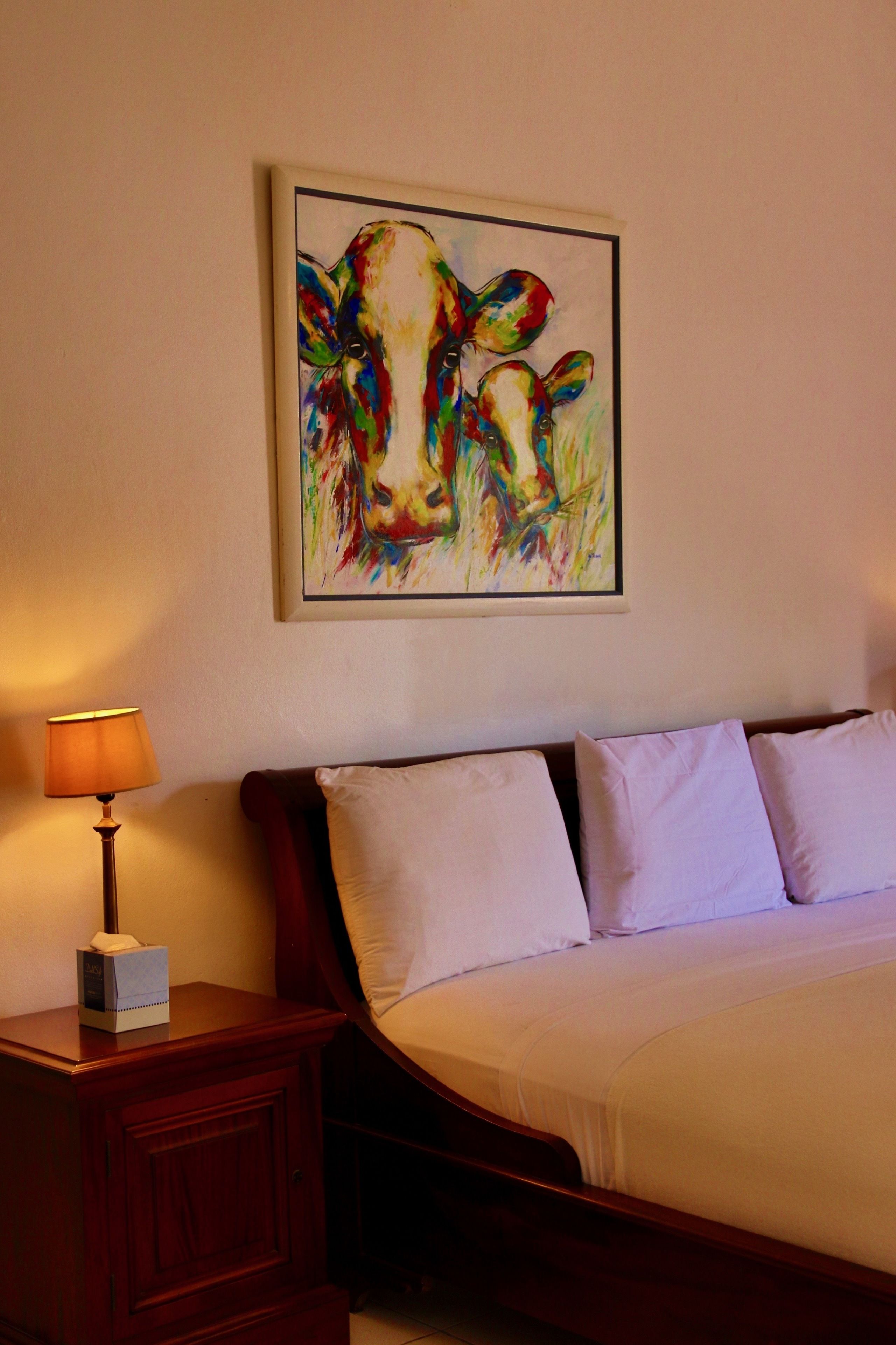 king room with garden view | premium bedding, iron/ironing board, free wifi, bed sheets