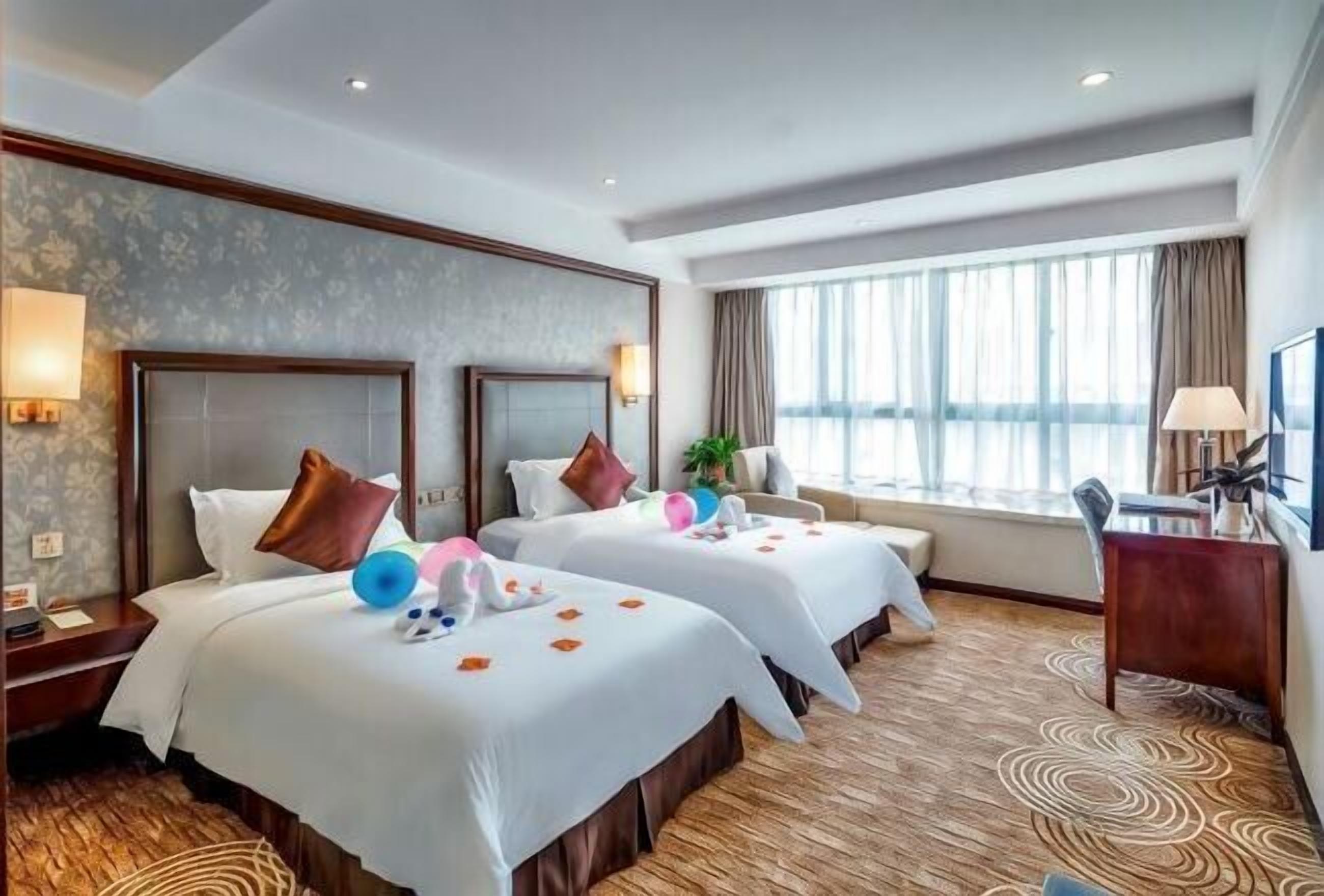 1 habitación, ropa de cama de alta calidad, cubrecamas y minibar 