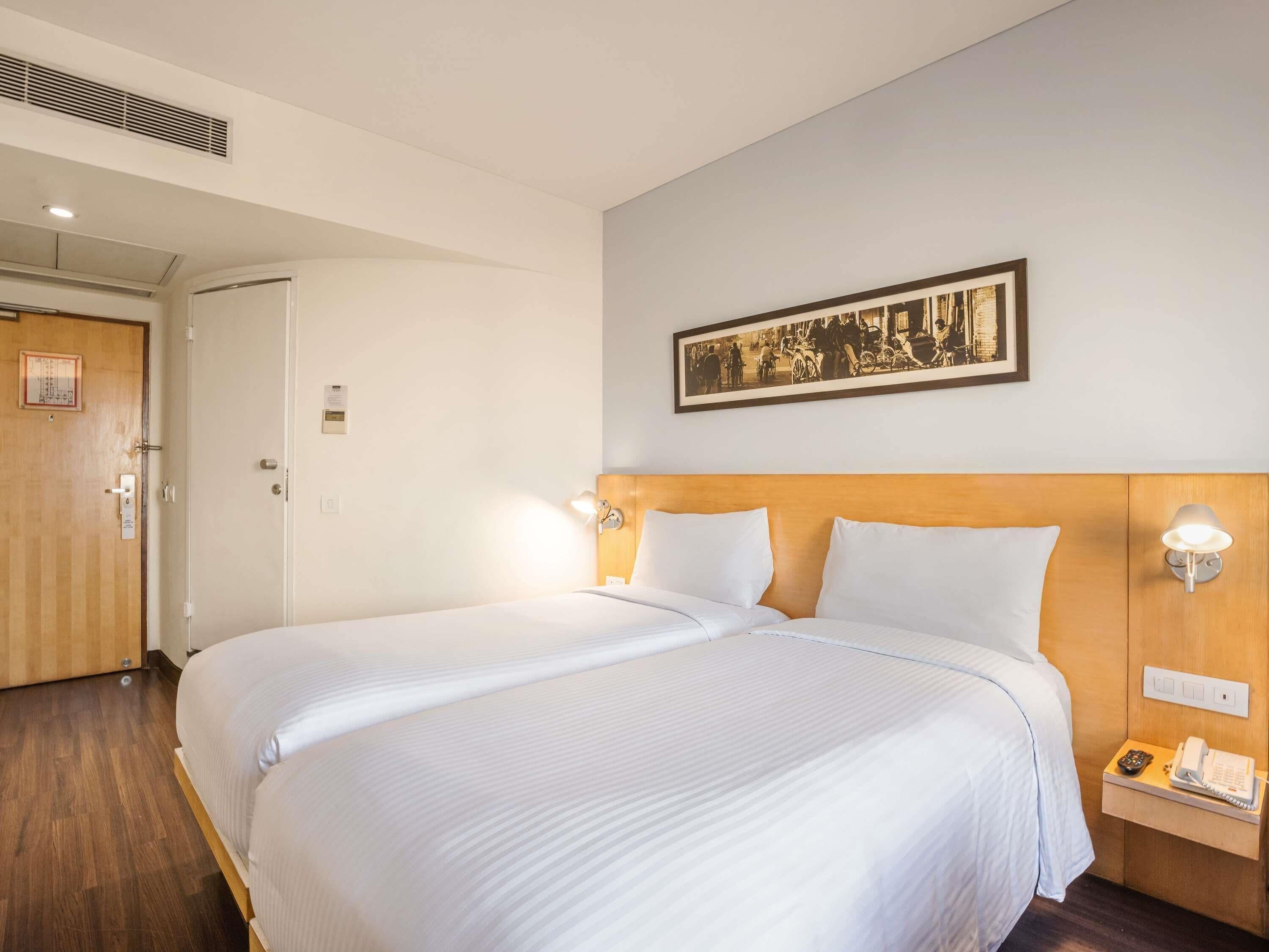 Premium bedding, down comforters, memory foam beds, minibar