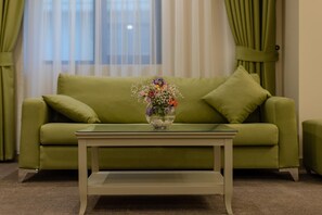 55-inch flat-screen TV with satellite channels, TV