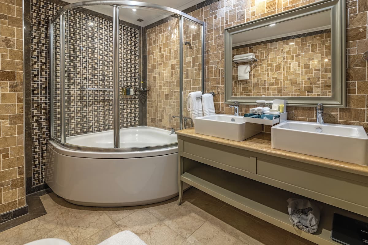 suite | bathroom | free toiletries, hair dryer, bathrobes, slippers
