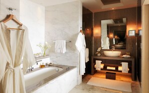 Separate tub and shower, deep soaking tub, designer toiletries