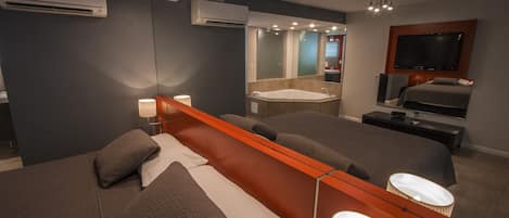 Escritorio, cortinas opacas, wifi gratis y ropa de cama